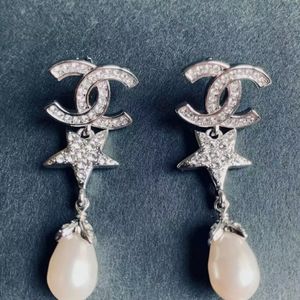 Authentic Chanel Silver Tone Crystal Pearl earring